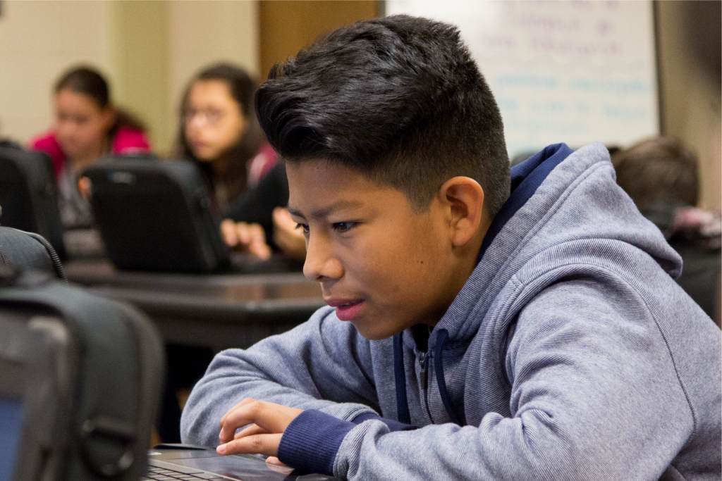 A student using a laptop