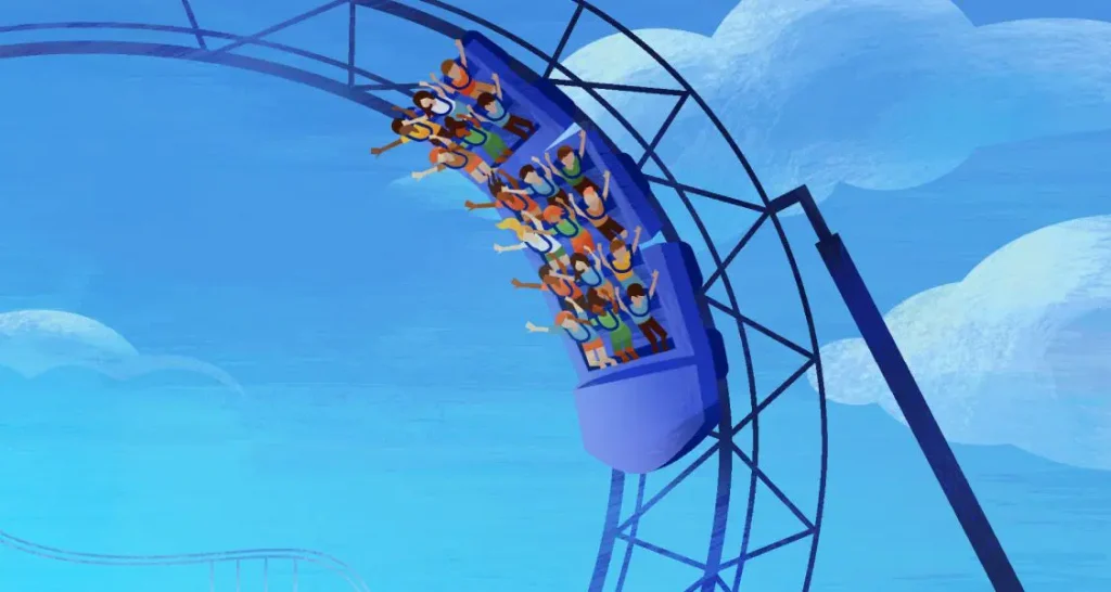 Illustration of a roller coaster filled with people, hands raised, going down a steep track against a bright blue sky with clouds.