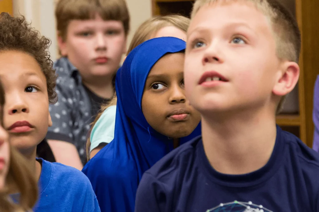 Several students listening attentively