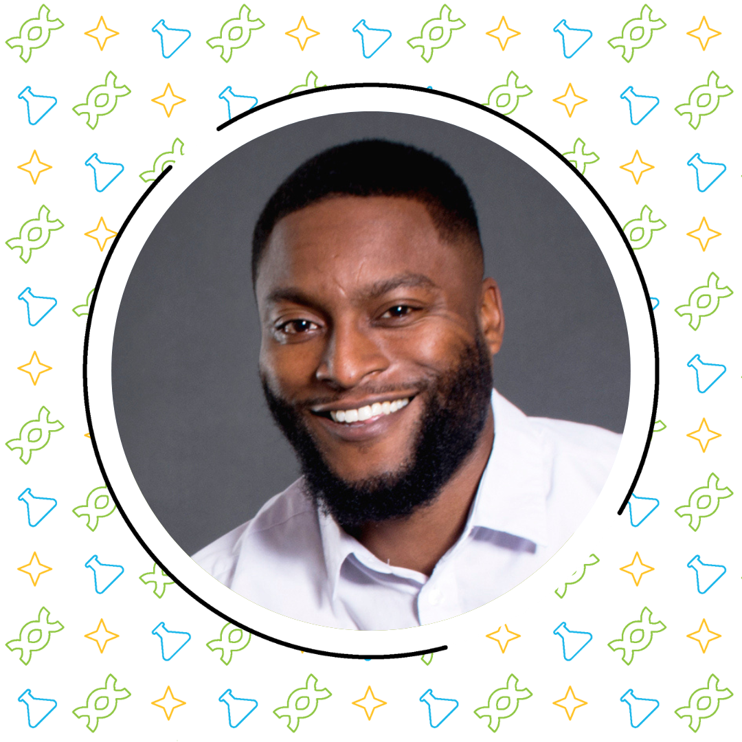 Portrait of a smiling man with a beard, wearing a white shirt, identified as Juan Vivas of SpaceX, framed by a decorative border with yellow and blue symbols.