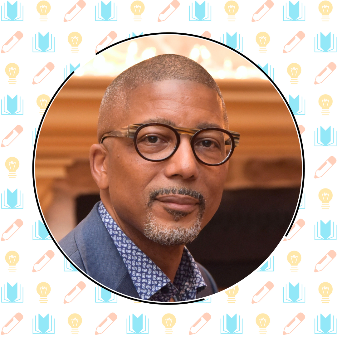 Portrait of a middle-aged man with glasses wearing a blue blazer and patterned shirt, set against a soft-focus background framed in a circular border with literacy education icons.