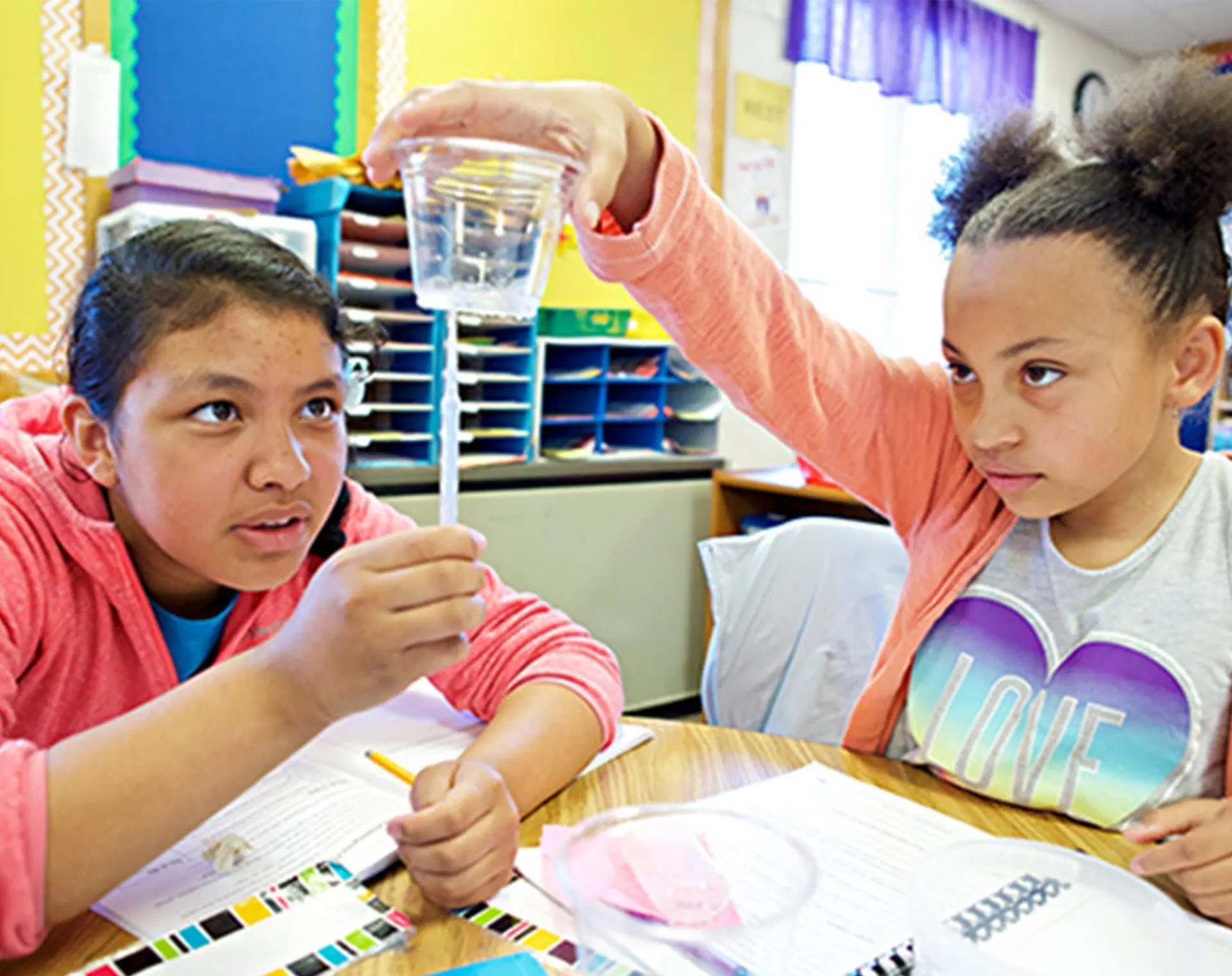 Two students working on a science experiment