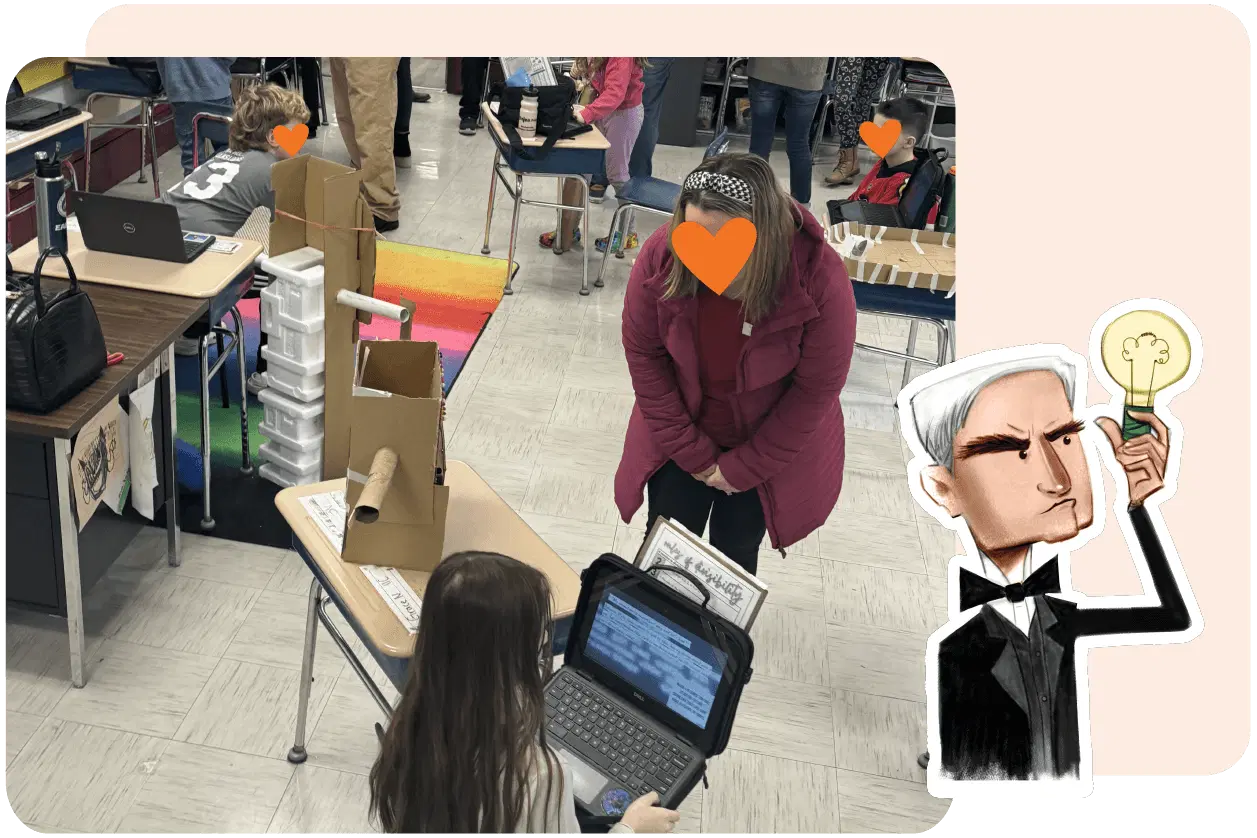 Classroom with students and a teacher interacting, cardboard projects on desks, and a cartoon character holding a light bulb in the corner.