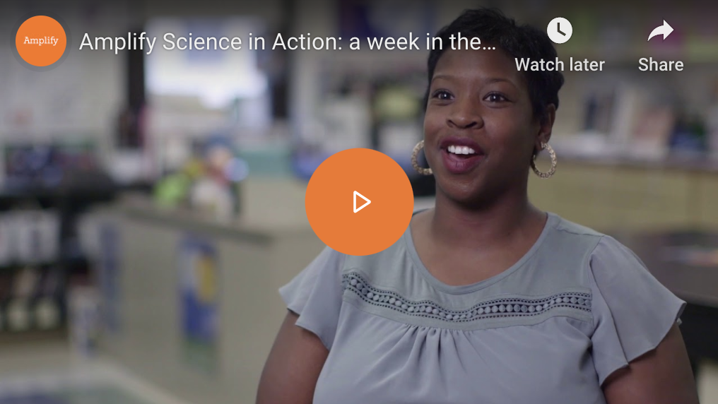 A screenshot from a video titled "amplify science in action: a week in the..." featuring a smiling woman sitting in a classroom setting.