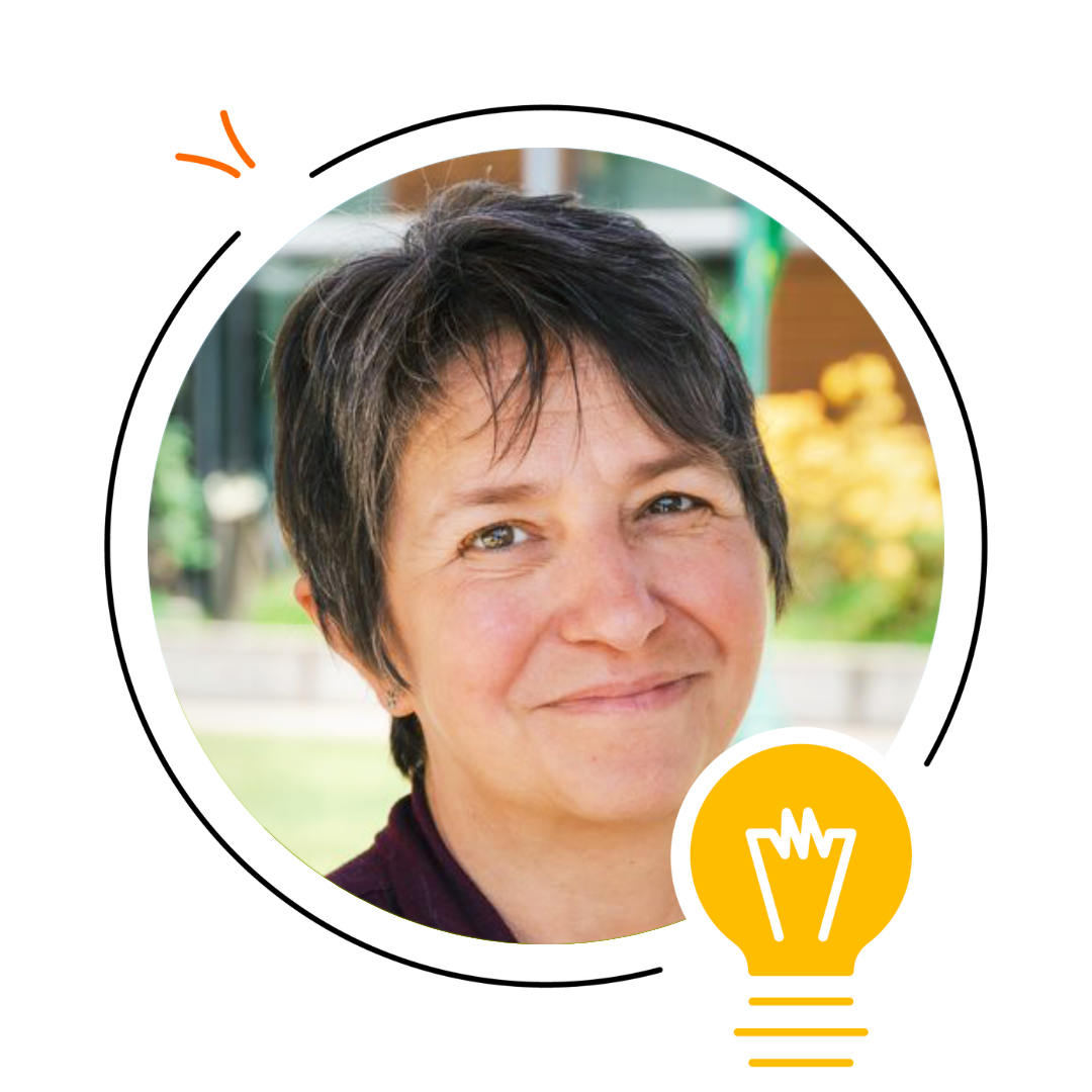 A middle-aged person with short dark hair smiles, pictured outdoors with greenery in the background. A yellow lightbulb graphic and simple line art frame the photo, evoking ideas from Science of Reading webinars and literacy programs.